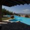 Tranquil Infinity Pool Getaway (private jacuzzi and steam bath, pool, garden, sea and city views) - Volos