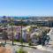 Remodeled 4 bdrm with AC, Jacuzzi, foosball, bikes, roof top deck, Steps to beach shopping and dining