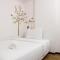 Spacious and Well Appointed 2BR @ Gateway Pasteur Apartment By Travelio