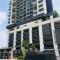 Conezion IOI Putrajaya (Rustic Suite, 3 Bedrooms, 2 Baths, WiFi, Pool & City View) by MRK