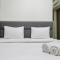 Sea View 1BR at Gold Coast Apartment near PIK By Travelio