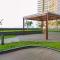 Sea View 1BR at Gold Coast Apartment near PIK By Travelio