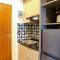 Minimalist and Comfy 1BR Grand Kamala Lagoon Apartment By Travelio