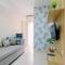 Modern and Comfortable 2BR Springlake Summarecon Bekasi Apartment By Travelio