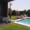 Palms Edge Villas avec Piscine & Jardin Privés