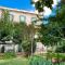 Au Saint Roch - Hôtel et Jardin