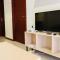 Minimalist and Cozy Room 1BR Asatti Apartment By Travelio