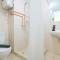 Elegant Studio at Springlake Summarecon Bekasi Apartment By Travelio