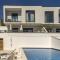 Foto: Seaside apartments with a swimming pool Rastici, Ciovo - 17889