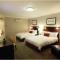 Carlyle Suites & Apartments