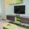 Elegant and Comfy 1BR Green Central City Glodok Apartment By Travelio