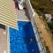 Foto: Apartments with a swimming pool Mali Rat (Omis) - 9698 14/19