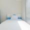 Minimalist 2BR Apartment The Springlake Summarecon By Travelio