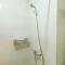 Fully Furnished Studio No Kitchen Apartment at Mustika Golf Residence By Travelio