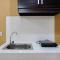 Luxury and Cozy Studio Apartment M-Town Residence By Travelio