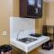 Luxury and Cozy Studio Apartment M-Town Residence By Travelio