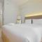 Modern Studio @ Springlake Summarecon Apartment By Travelio - Rawabugel Modern Studio @ Springlake Summarecon Apartment By Travelio - Rawabugel