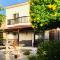 VILLA ALICIA with priv pool, beautiful garden and shady veranda- 5 min to the beach
