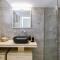 Minimal apartment on the shadow of the Acropolis - Athen