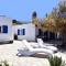 The Stone Beach House in the area of Kampi, Koundouros