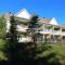 Splendid Mountain View Condo with Pool, BBQ & Terrace - Water Park, MTB, Cycling, Golf! - Bromont