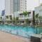 Modern Look 1BR at Brooklyn Alam Sutera Apartment By Travelio