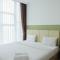 Modern Look 1BR at Brooklyn Alam Sutera Apartment By Travelio
