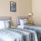 Golden Palms Guest House & Cafe