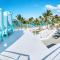 Dream Punta Cana Beachfront Apartment - 4-Bedroom Penthouse with Rooftop BBQ & Ocean Views