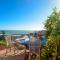 casa vista mare con wifi, AC nelle 4 camere da letto e parcheggio privato