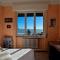 casa vista mare con wifi, AC nelle 4 camere da letto e parcheggio privato