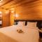 Natures Abode - The Wooden Villa at Morjim by StayVista