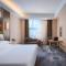 Vienna Hotel (Shanghai jinshanwei Railway Station City Beach Shop) - Jinshan