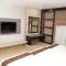 Boss Suites Nana Hotel