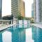 Modern and Comfortable 2BR at The Masterpiece Condominium Epicentrum Apartment By Travelio