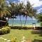 Coconut Grove Beachfront Cottages - Матей