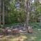 Cozy Manistique Cabin with Deck, Grill and Fire Pit!