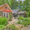 Waterfront Great Pond Cottage with Hot Tub and Deck!