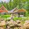 Waterfront Great Pond Cottage with Hot Tub and Deck!