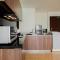 Comfy 3BR at LAvenue Apartment Pancoran By Travelio