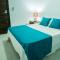Malecon Rooms y Hotel