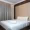 Minimalist and Cozy 2BR Citralake Suites Apartment By Travelio