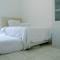 Cozy Studio Apartment at Margonda Residence 4 By Travelio