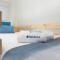 Host Wise - Trendy Bright Flats with Jacuzzi - 5 min Beach
