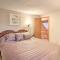Lakeview Forest Cabin with Deck Less Than half Mile to Beach!