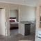 TOWER JUNCTION MOTOR LODGE- MOTEL with Airport and Railway Station Shuttle service- Best Location - close to Westfield Mall, Tower Junction Shopping Centre, Restaurants, Cafes etc