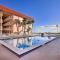 Sunny Cocoa Beach Condo with Balcony and Pool Access - Cocoa Beach