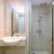 New Furnished 1BR Apartment at Gold Coast near PIK By Travelio