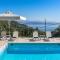 Villa Andonis Nissaki large villa with large pool ,spectacular view very near to the Beach