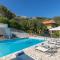 Villa Andonis Nissaki large villa with large pool ,spectacular view very near to the Beach